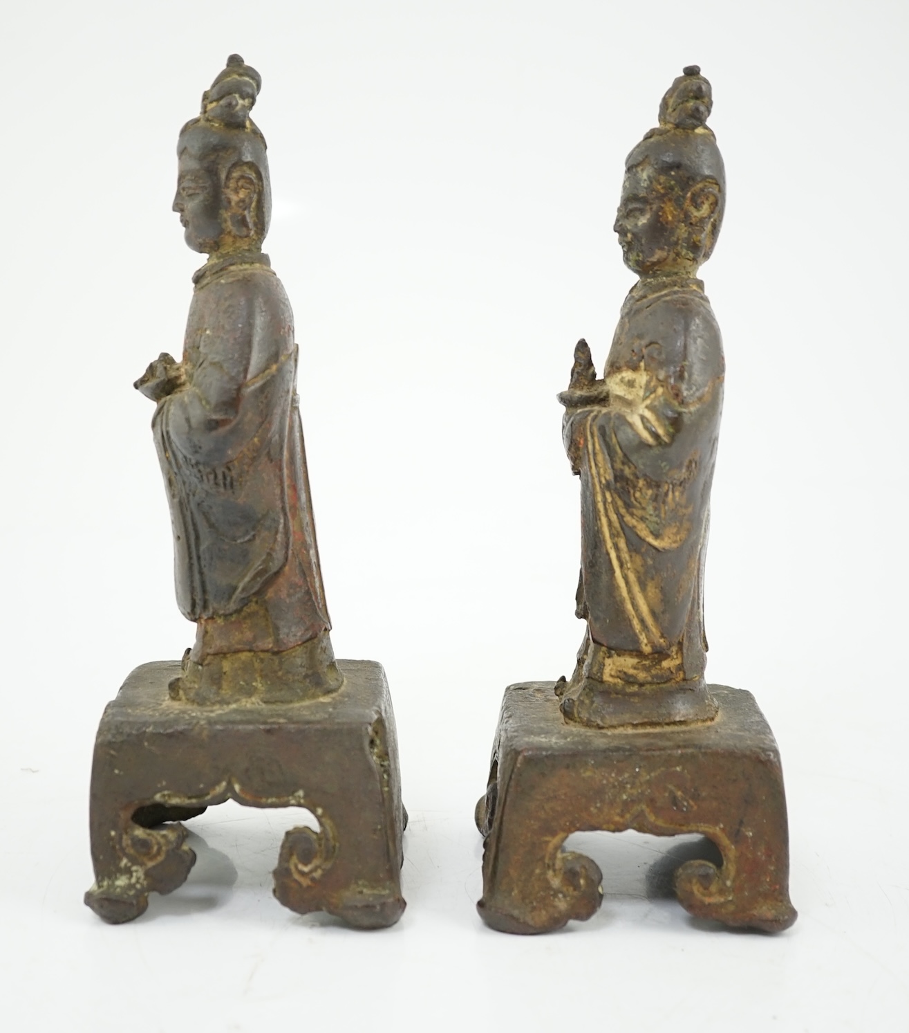 A pair of Chinese Ming bronze figures of attendants